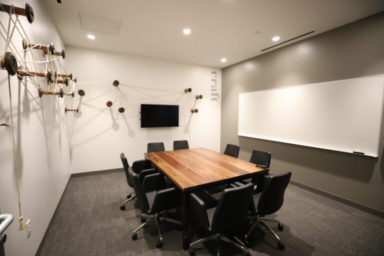 Meeting room seating up to 8 people