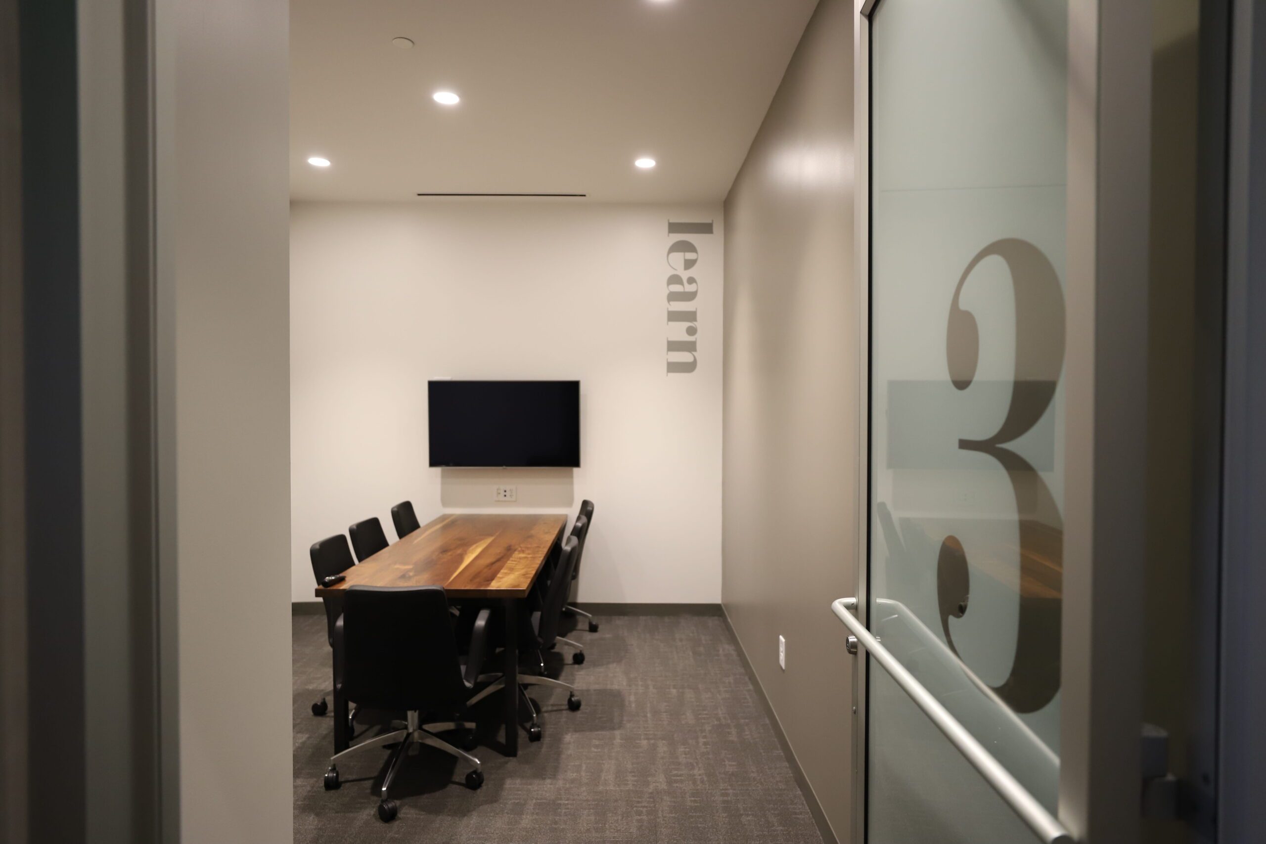 Conference room seating up to 7 people