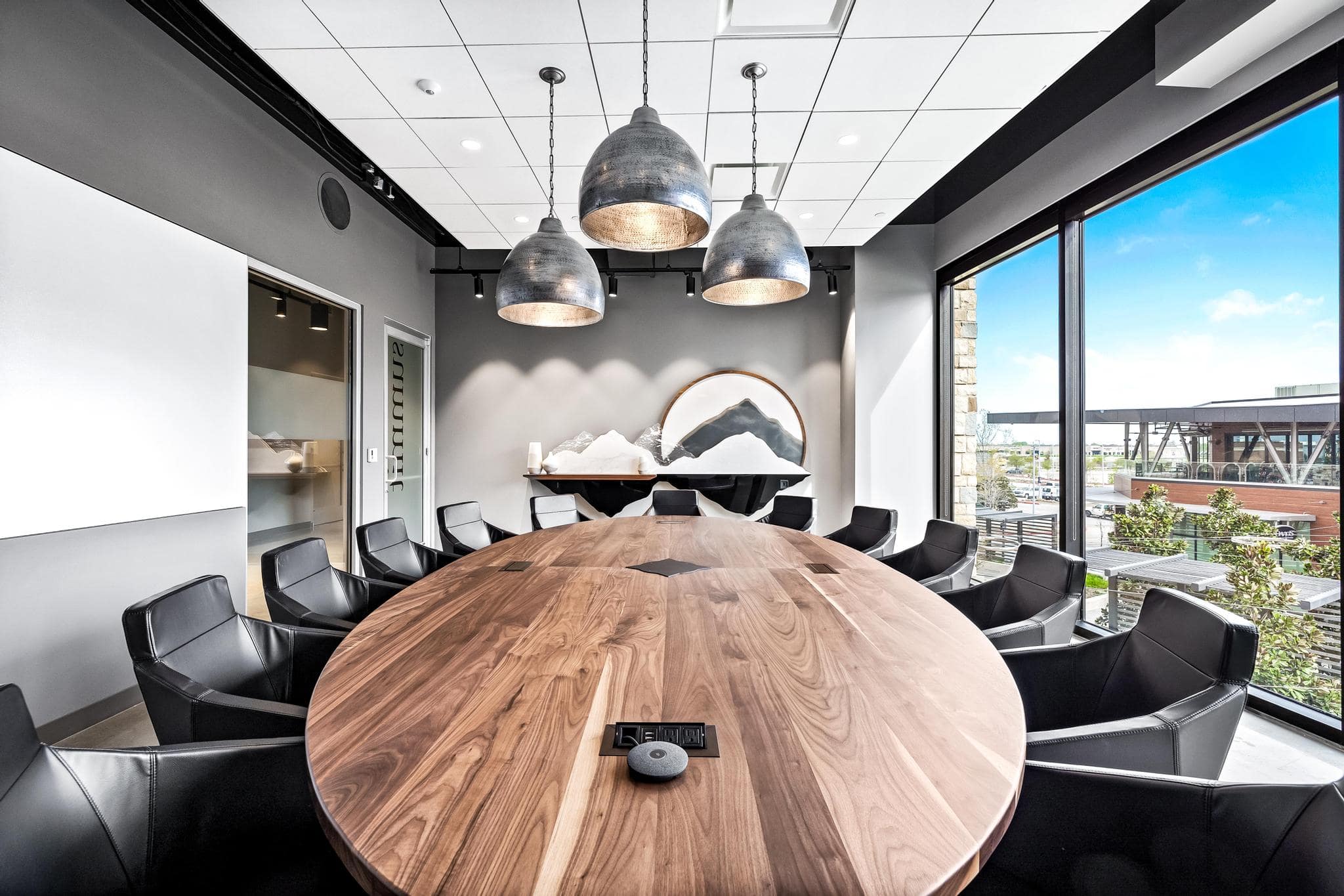 Summit, luxury boardroom with 14 chairs, dry erase wall, and windows