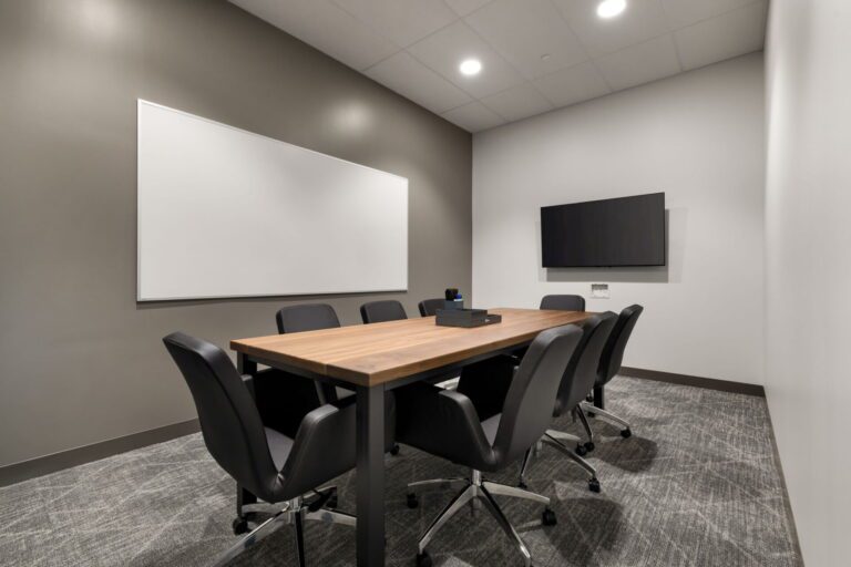 Meeting room seating up to 8 people